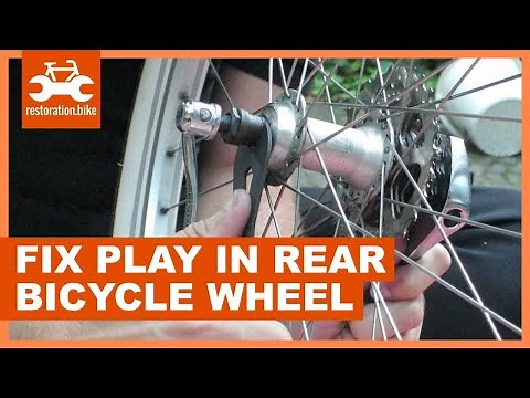 How to fix play in rear bicycle wheel