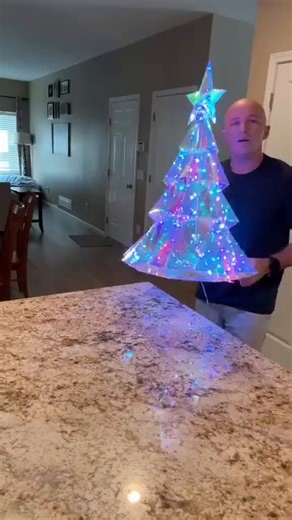 The RGB Holographic Christmas Tree is more than a decoration—it's a mesmerizing light sculpture that brings the wonder of the season to life with breathtaking depth and dynamic color. Learn more about rgb holographic christmas trees | Mary DiGiovanni Ryan | Facebook