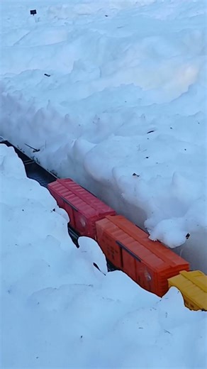 Blink and you'll miss it. 8632 moving fast freight on the freshly reopened line.