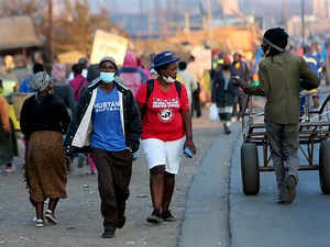 ‘Overwhelmed, overrun’: Zimbabwe tightens COVID restrictions