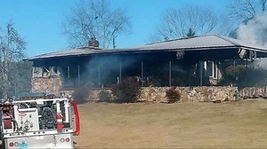 Arson investigators look into fire that destroyed home of Roy Moore accuser