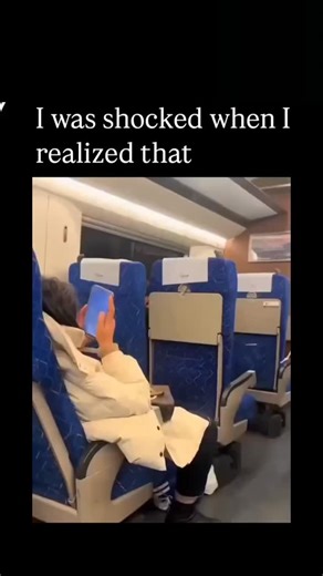 trend tok reel on Instagram: "The video depicts a passenger on public transport whose side profile, zoomed in closely, mimics a disturbing facial deformity due to shadows and angle, but reveals itself as simply an ear fitted with a black wireless earbud, prompting the caption's feigned shock. Shared by @Crazymoments01 , an account curating global viral clips, the post exploded to 1.7 million views and 700 likes in under 24 hours, capitalising on the universal thrill of optical illusions in every