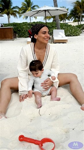 Ana Brenda Contreras and her 9-month-old daughter Aria enjoy a family vacation at the beach
