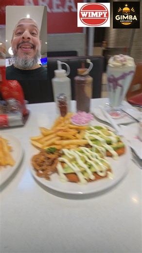 Wimpy’s Killarney Mall NEW Menu Launch – 4 November 2025 South Africa, it’s here. Wimpy just launched their brand-new menu, and The Gimba Express had to pull up for a taste test. From classic comfort favourites to bold new flavours, this menu is stacked. Here’s what’s new: • Toasted Cheese & Mince • Crunchy Coleslaw Burger • Creamy Peri Peri Chicken Livers & Egg • Double Avo Schnitzel • Chocolate Brownie • Strawberry Coke Cooler (Single Serve) • Tropical Soda (Single Serve) • Strawberry & Coke C