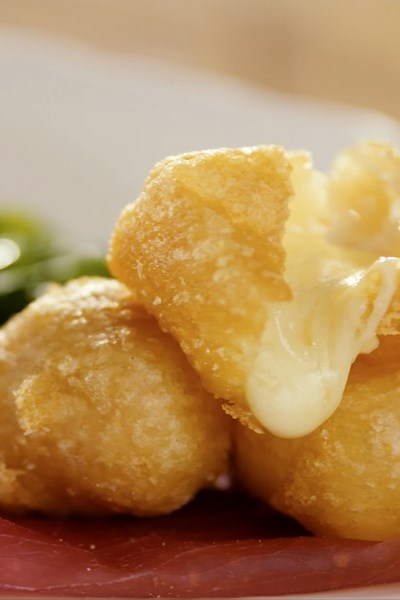 Crispy deep-fried Fontina cheese bites