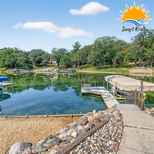 Welcome to this lovely brick waterfront home on the East side of Lake...