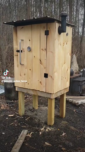 I absolutely do not like country rap lol but my husband does and this diy smokehouse has been his project and it has his whole heart 😂 he's talked about having a smokehouse since we were dating ( 10 years ago 🤯) so another one of his dreams come true. the smokehouse was built with some scrap wood although he did have to buy new wood also. the wood stove was bought at an auction and we had extra tin for the roof. the handle, smoke stack, and temperature gages are from our pit boss smoker that b