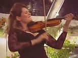 Lettice Rowbotham shows off violin skills in Barbados getaway