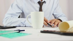 Accidentally spilling coffee on planes - Free Stock Video