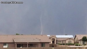 LANDSPOUT TORNADO IN ARIZONA Shot by 12 News viewer Bill Brannen near the Kingman Airport on July 27, the video shows a thin column of clouds moving through a neighborhood. FULL STORY: http://12ne.ws/2aAlQJb | 12News