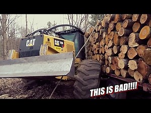 SKIDDER LOG TRUCK.... TANGLED UP!!!