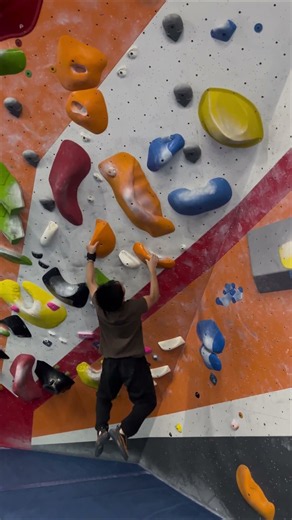 Dylan dynos to an undercling in a V6 (orange) bouldering problem - DnB Remix