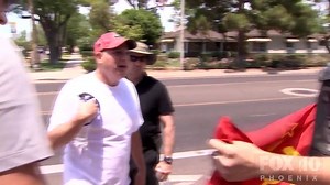 It was mostly a peaceful event, but tempers sometimes flared outside the Trump rally yesterday. Here are a few examples of how the men and women of the Phoenix Police Department managed to keep the peace. There were no arrests made, as people on both sides exercised their First Amendment Rights. You'll notice officers standing by, but not preventing anyone from speaking their minds. | FOX 10 Phoenix