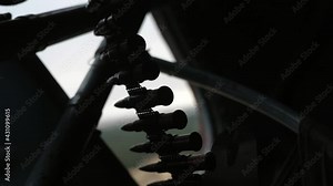 Air machine gun with a trembling cartridge tape and bullets installed in a chopper