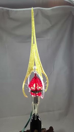 Red Merry Glow Round Rotating Tree Topper - light