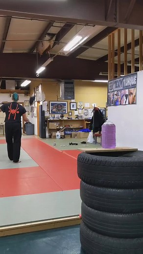 Mastering the Chinese Rope Dart: Backwards Roll Success