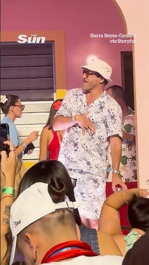 Moment Mad Men star Jon Hamm shows off dance moves at Bad Bunny concert