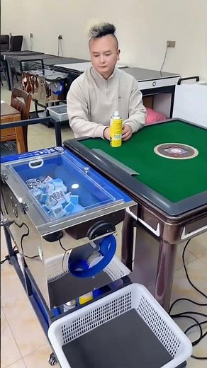 automatic mahjong table with an integrated tile cleaning and shuffling machine.
