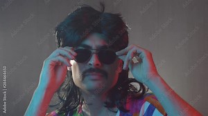 A man from the 70s 80s 90s with a mustache and a mullet hairstyle. Retro concept
