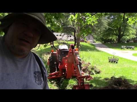 How to Make a Swale Drainage Ditch with Kubota L3301 HST Diesel Tractor and BH77 Backhoe