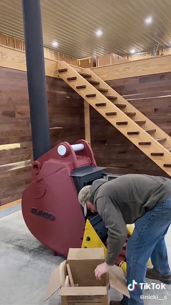 Homemade Wood Burning Furnace in Barn by Husband and Wife