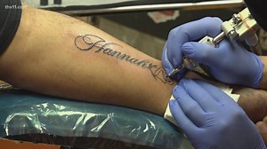 Despite popular bad luck belief, couples get inked with love on Valentine's Day