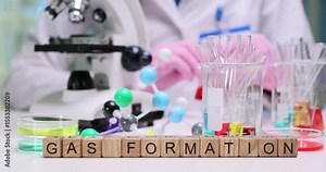 Exploring gas formation in a lab using specialized equipment and colorful solutions during experiments