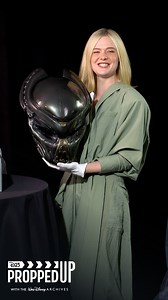 458K views · 13K reactions | In celebration of Predator: Badlands, we hunted down some iconic props from Walt Disney Archives to show Elle Fanning! We reunited Elle with costume pieces from Maleficent: Mistress of Evil and The Great—plus, she got an up-close look at a Yaujta helmet. Stream Maleficent: Mistress of Evil on Disney+, and The Predator and all episodes of The Great on Hulu. See Predator: Badlands in theaters now! | Disney D23 | Facebook