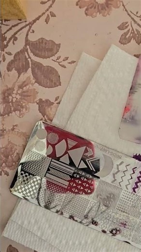 Purple chevron stamped nails