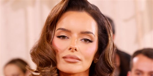 Maura Higgins of 'The Traitors' Goes Pantsless in Nothing but a Plunging Corset Jacket and Sheer Lace Tights