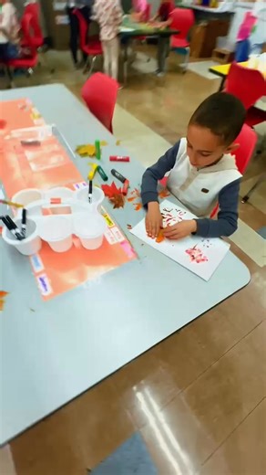 Kindergarten Art class embracing fall fun!! They gathered leaves outside and then crafted leaf artwork!🍂🍁 | Donovan Elementary School