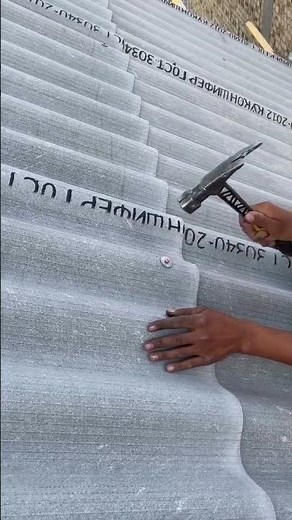 Precision Roofing Technique: Securing Corrugated Sheets 🏠#Roofing #Construction #Building #Handyman