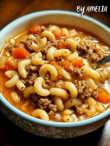 Beef Macaroni Soup – A Hearty One-Pot Family Favorite This cozy soup is packed with ground beef, tender pasta, and rich tomato flavor. Perfect for an easy weeknight dinner! Ingredients 1 tbsp olive oil 1 small white onion, diced 3 cloves garlic, minced 1 lb ground beef 3 cups beef broth 1 (14.5 oz) can diced tomatoes 1 (29 oz) can tomato sauce 2 tbsp brown sugar 1 tbsp Worcestershire sauce 1 tsp dried basil 1 tsp dried oregano 1 tsp dried thyme 2 bay leaves 2 cups elbow macaroni Salt and pepper,