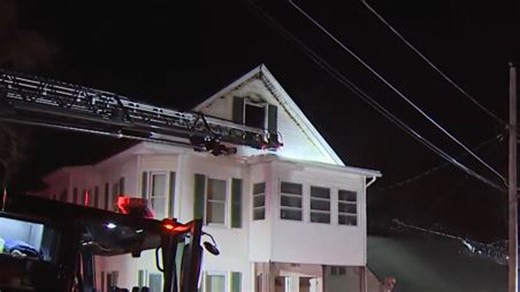 Crews use ladder truck to fight Lowell fire