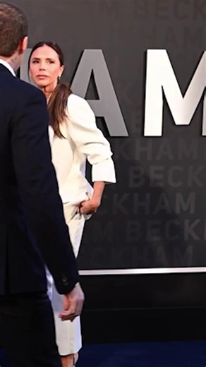 A clip of stony-faced Nicola Peltz being pulled into a Beckham family picture goes viral after her husband Brooklyn's explosive online statement | OK! Magazine UK