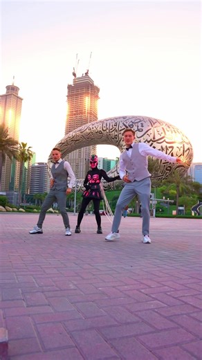 Futuristic Dance Performers in Glowing Costumes