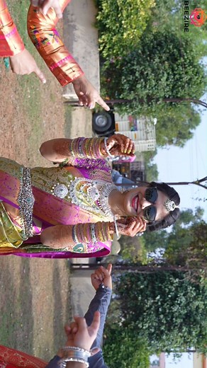"Embracing tradition with a touch of modern elegance. South Indian bride radiates grace, surrounded by the joyous vibes of her vibrant bridesmaids. 🌺✨ #SouthIndianSplendor #BridalBliss" | Bezire