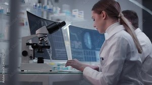Female doctor working in laboratory. Studying human skeleton dna DNA samples