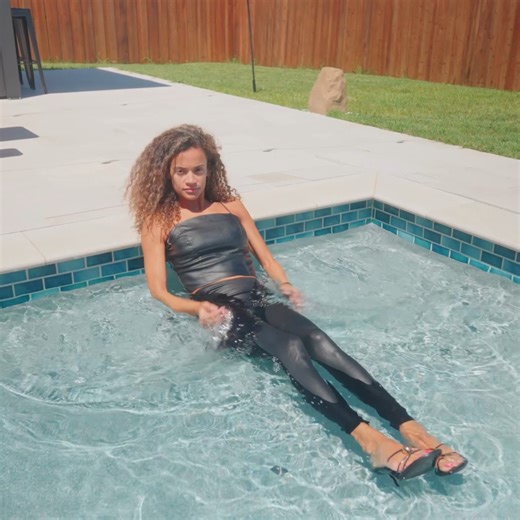 WetlookFashion | Jasmine takes a dip in the pool wearing shiny leggings and a leather top. Get early access to this clip at wetlookfashion.net #wetlook... | Instagram