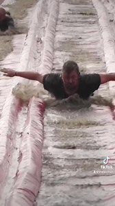 2.2K views · 35 reactions | The moment of glory for every wolf on The Wolf Run - THE SLIDE  Our Slip & Slide is the longest in any obstacle course around. Hands up if you dare to take the plunge... Follow us on TikTok for more of this @thewolfrun #thewolfrun #wolfrun | The WOLF RUN | Facebook