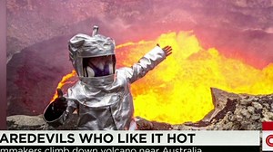 Man climbs into the mouth of a volcano