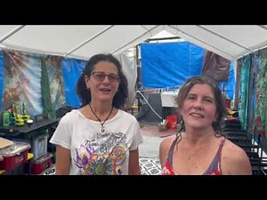 Two women enjoy Communal Showers