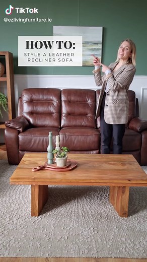 How to style a leather recliner sofa 🙌To add warmth and texture to your leather sofa start by hanging a coloured throw over one arm ✅Add a plain cushion for contrast✅Finish the look by adding a coloured cushion to tie everything together✅Make sure to not over dress your sofa and leave enough room for comfortable seating!🔥It's just that EZ!👏#ez #ezliving #ezlivingfurniture #howto #homedecor #homestyling #furniture #interiors #interiordecor #interiordesign #irish #mymoneydontjiggle