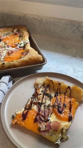 Ashley | Suburban Homestead on Instagram: "Tomato Tart is my new love language 🍅🌿😍 2 sheets of puff pastry 1 tomato, sliced Handful of basil, chopped 3 slices of cooked bacon, chopped 4 oz goat cheese Sliced Mozzarella (I used the mini balls) 1 egg for egg wash Salt and pepper Olive oil Thaw pastry at room temperature for 30 minutes. Preheat oven to 400 F. Line a large baking sheet with parchment paper and set aside. Slice your tomato into 8- 1/4 inch pieces. Lay each piece flat on paper towe