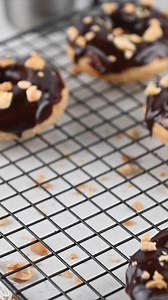 Nothing better than rich peanut butter donuts DIPPED IN CHOCOLATE! Recipe: https://www.crazyforcrust.com/chocolate-dipped-peanut-butter-donuts/ | CrazyforCrust