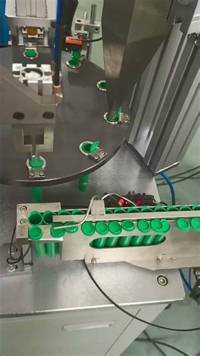 Flip pop top tube filling and closing machine for pre-rolls