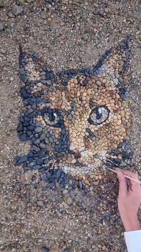 Meet an artist who brings nature to life in the most extraordinary way — crafting breathtaking portraits of humans & animals entirely out of tiny, colorful stones. Each piece is a masterpiece of patience & precision, where every pebble plays a part in forming a face so lifelike it could be mistaken for a painting. From afar, you see emotion & realism; up close, you discover the beauty of nature’s textures working in harmony. Artist @pebblepicassos | Artistworldly