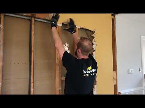 Installing a pass through window on a load bearing wall with a pocket door