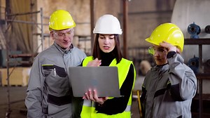 Free stock video - Three co-workers at the factory