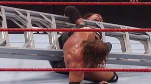 Triple H uses a ladder to help him apply the Figure-Four on Kevin Nash: WWE TLC 2011